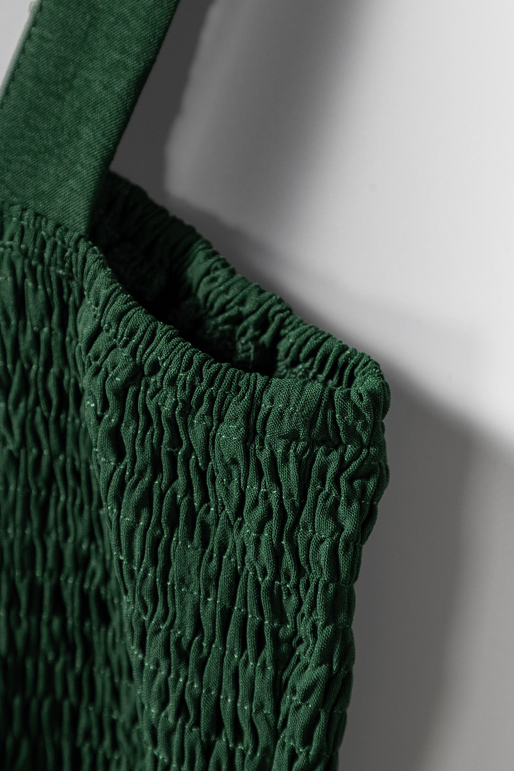 จั๊มสูทขากว้างแขนกุดสม็อคสีเขียวมีกระเป๋า